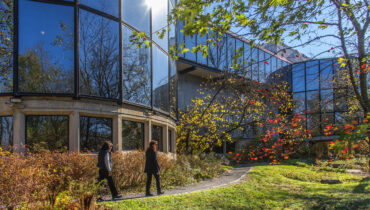 Two people walk outside the Brandywine Museum.