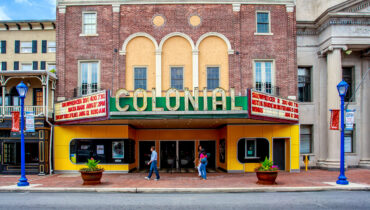 Old-fashioned, red-brick movie theatre.