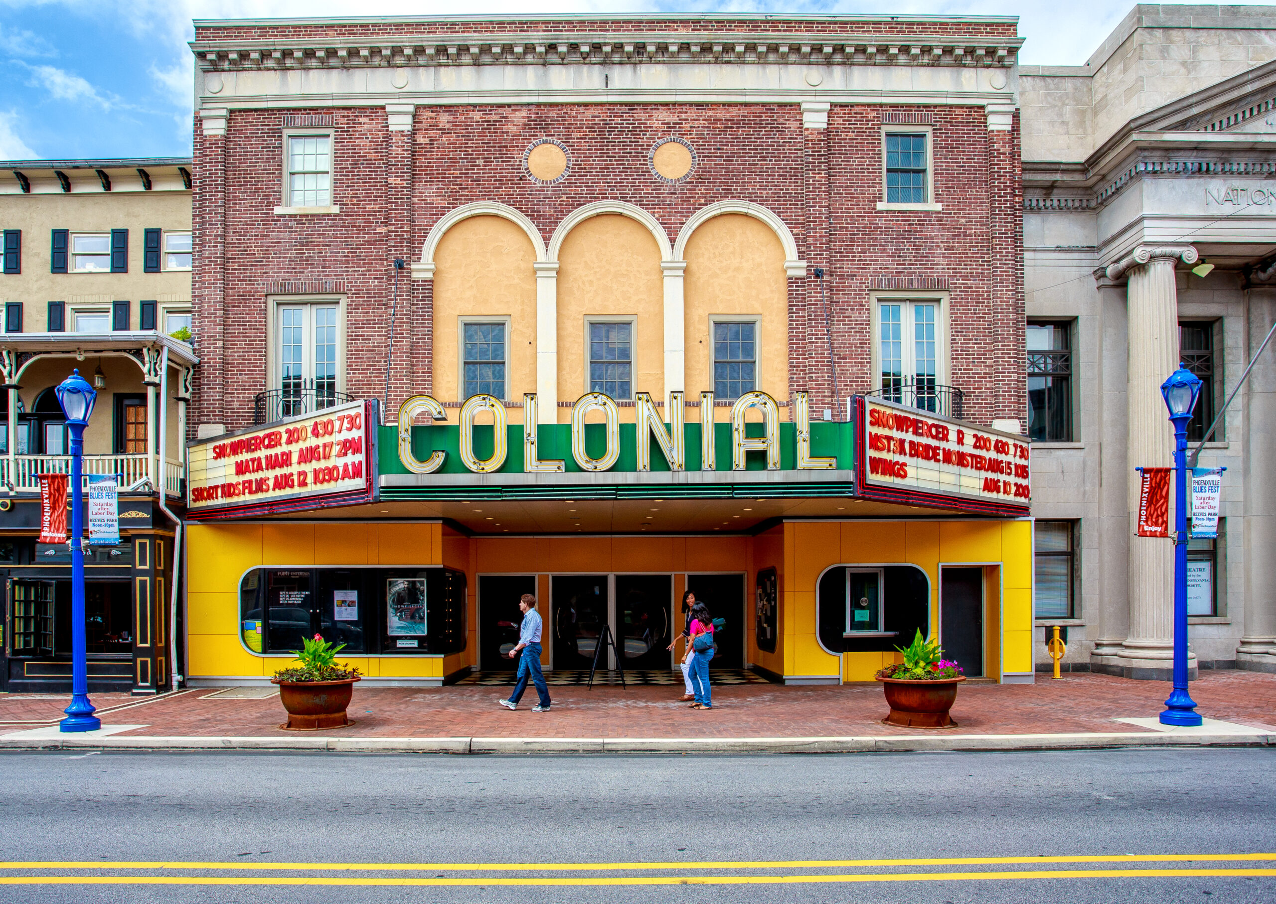 Old-fashioned, red-brick movie theatre.